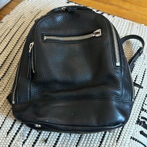 Mackage Backpack ( stain inside)